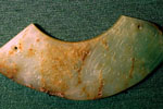 Section of a pectoral ornament (huang) that would have included several pieces of this type as well as a number of beads
