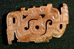 Plaque Carved with Highly Stylized, Intertwined Dragons