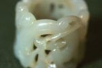 Thumb ring, pierced and carved with a dragon motif